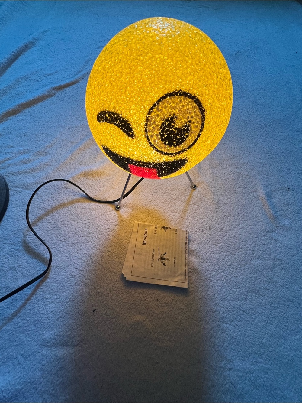 Yellow Emoji Table Lamp with Winking Tongue Design